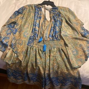 never worn. purchased From GILT. beautiful jewel color. silky material well-made